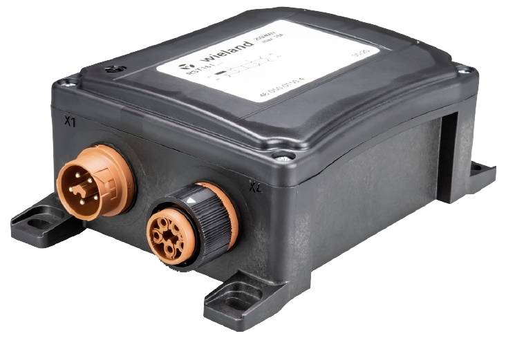 Ein elektrisches Gerät mit zwei runden Steckverbindern, orange und schwarz, montiert in einem robusten, rechteckigen Gehäuse.