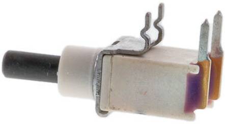 Eine kleine elektrische Komponente mit Metallverbindern und einem Kunststoffgehäuse, wahrscheinlich ein Schalter oder Sensor, der in elektronischen Schaltkreisen verwendet wird.