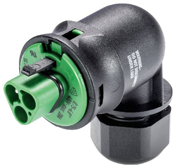 Ein schwarzer Sensor mit einem grünen Stecker und weißem Warntext auf der Seite. Der Sensor hat eine rundliche Form.