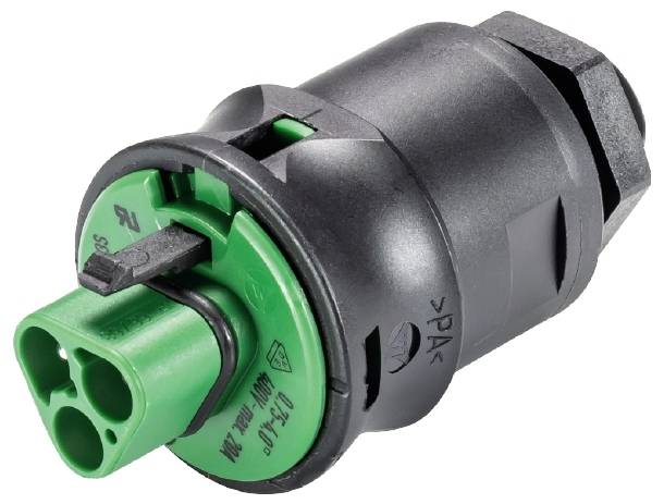 Ein grüner, zylinderförmiger elektrischer Stecker mit schwarzem Kunststoffgehäuse, geeignet für elektrotechnische Verbindungen.