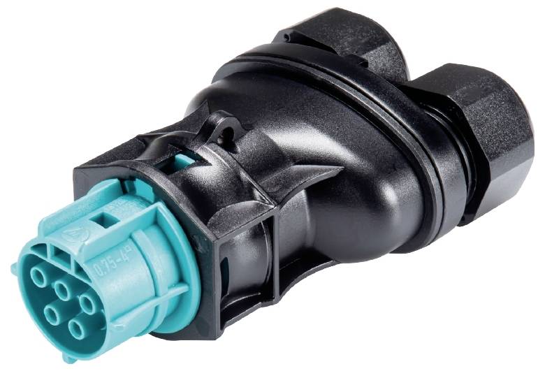 Ein schwarzer und türkisfarbener Steckverbinder mit mehreren Pins, verwendet für elektrische Verbindungen in technischen Geräten.