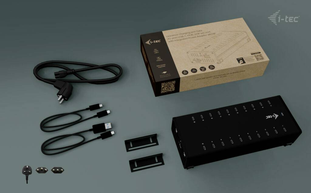'i-tec' Ladestation für mehrere Geräte, inklusive Netzteil, USB Kabel und Befestigungsteile, auf grauem Hintergrund.