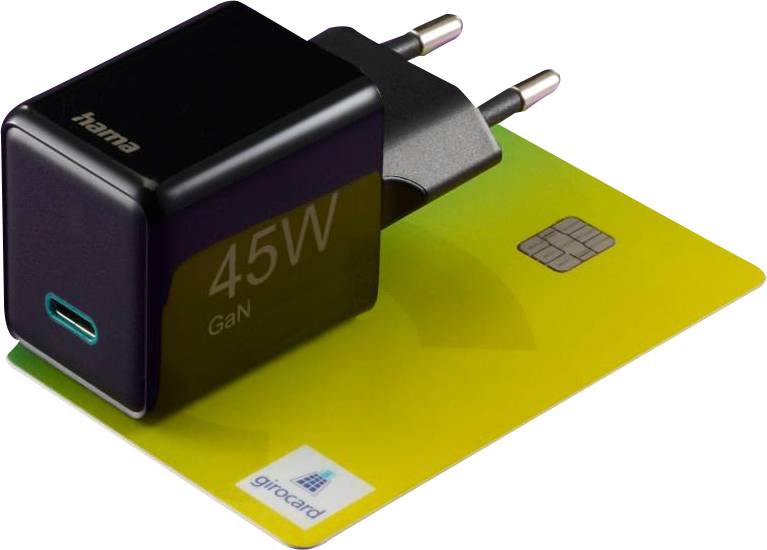 Ein schwarzes 45W GaN-Ladegerät mit gelbem USB-C-Anschluss liegt auf einer gelben Girocard.