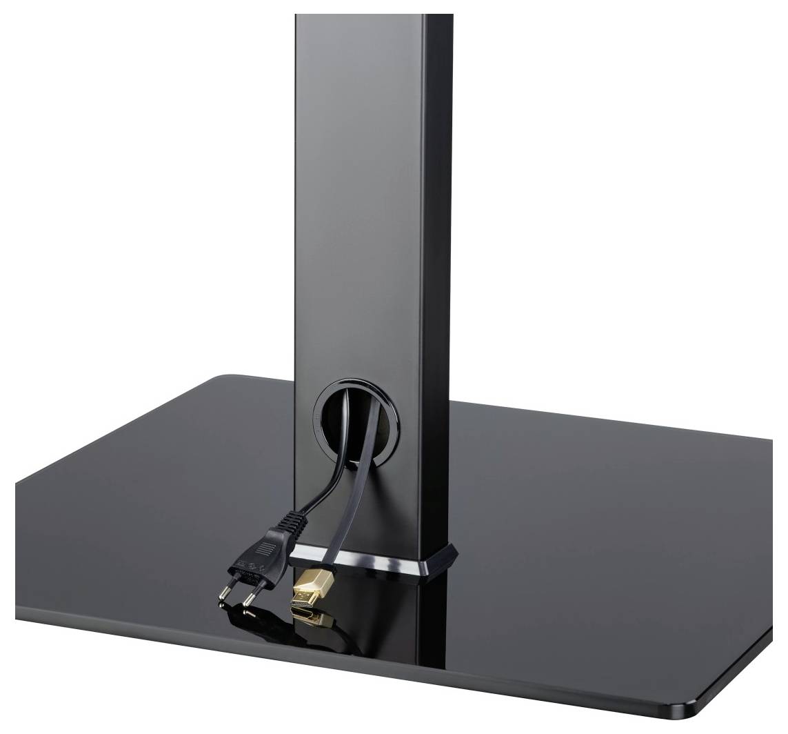 Ein schwarzer Monitorständer mit Kabeldurchführung, an der Rückseite zwei Kabel: ein Stromkabel und ein HDMI-Kabel.