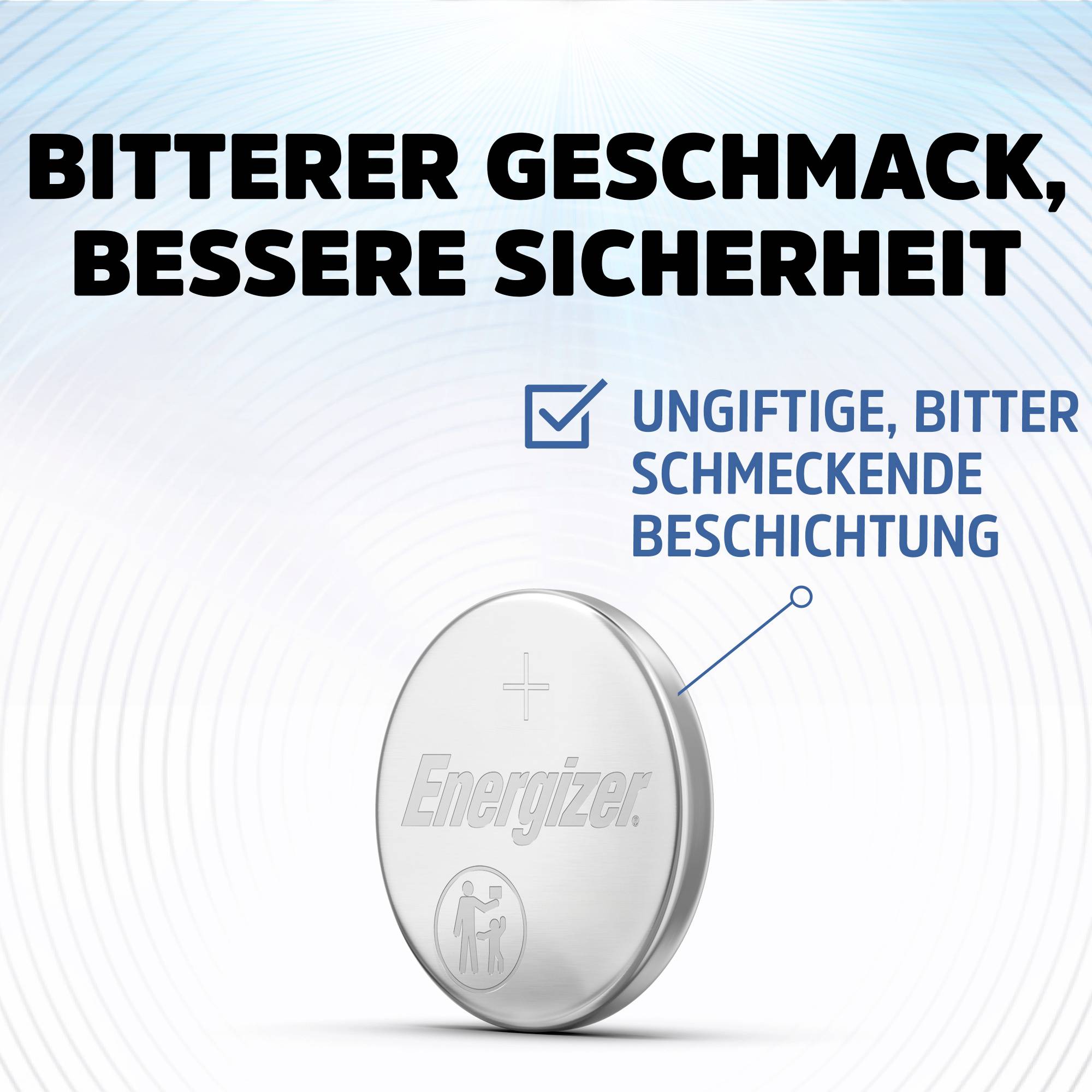 Eine Energizer-Knopfzellenbatterie mit Aufschrift 'Bitterer Geschmack, bessere Sicherheit', weist auf die ungiftige, bittere Beschichtung hin.