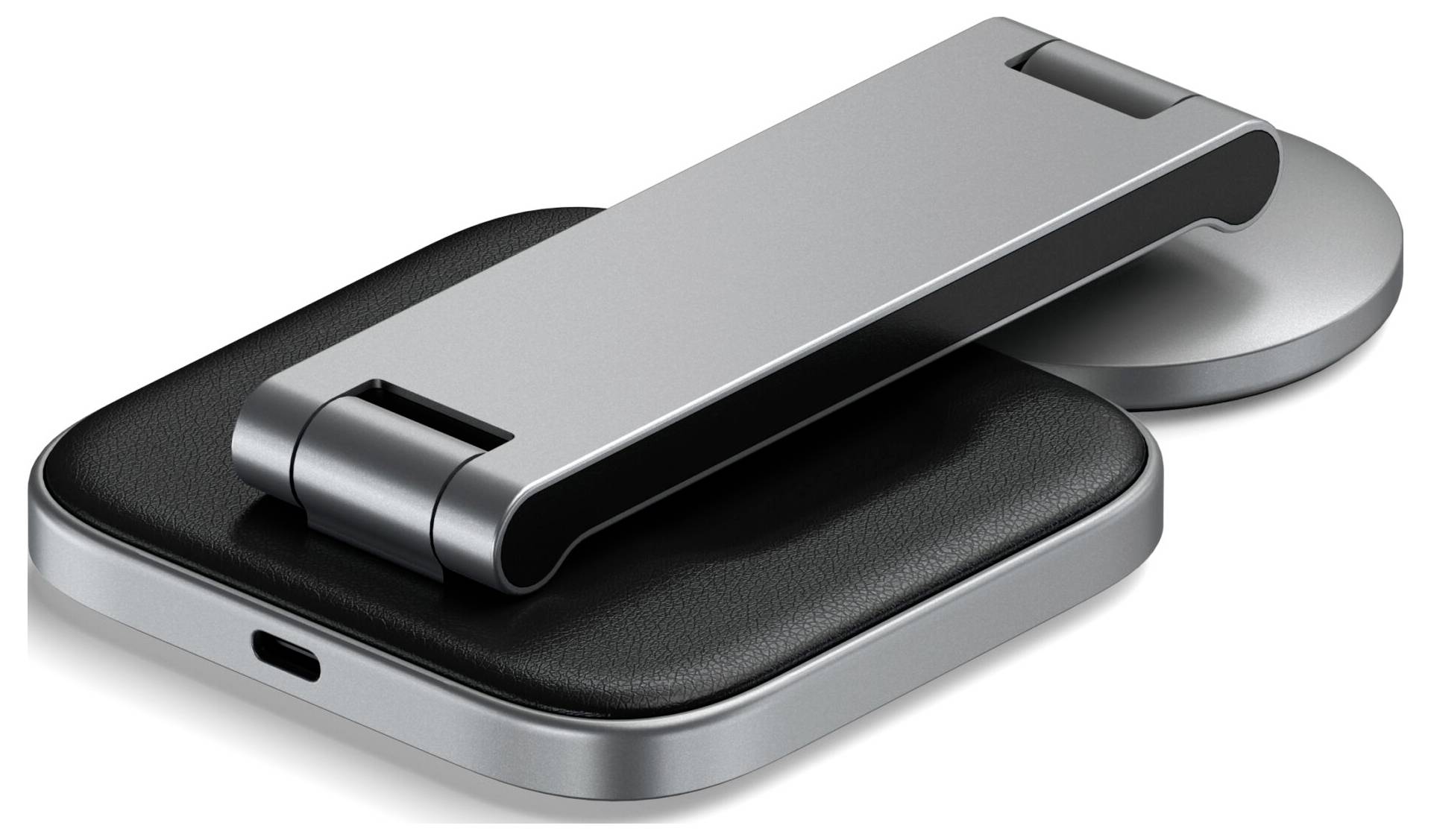 Ein zusammenklappbarer, tragbarer Laptop-Ständer aus Metall mit einer Lederbasis. Geeignet zum Erhöhen eines Laptops für bessere Ergonomie.