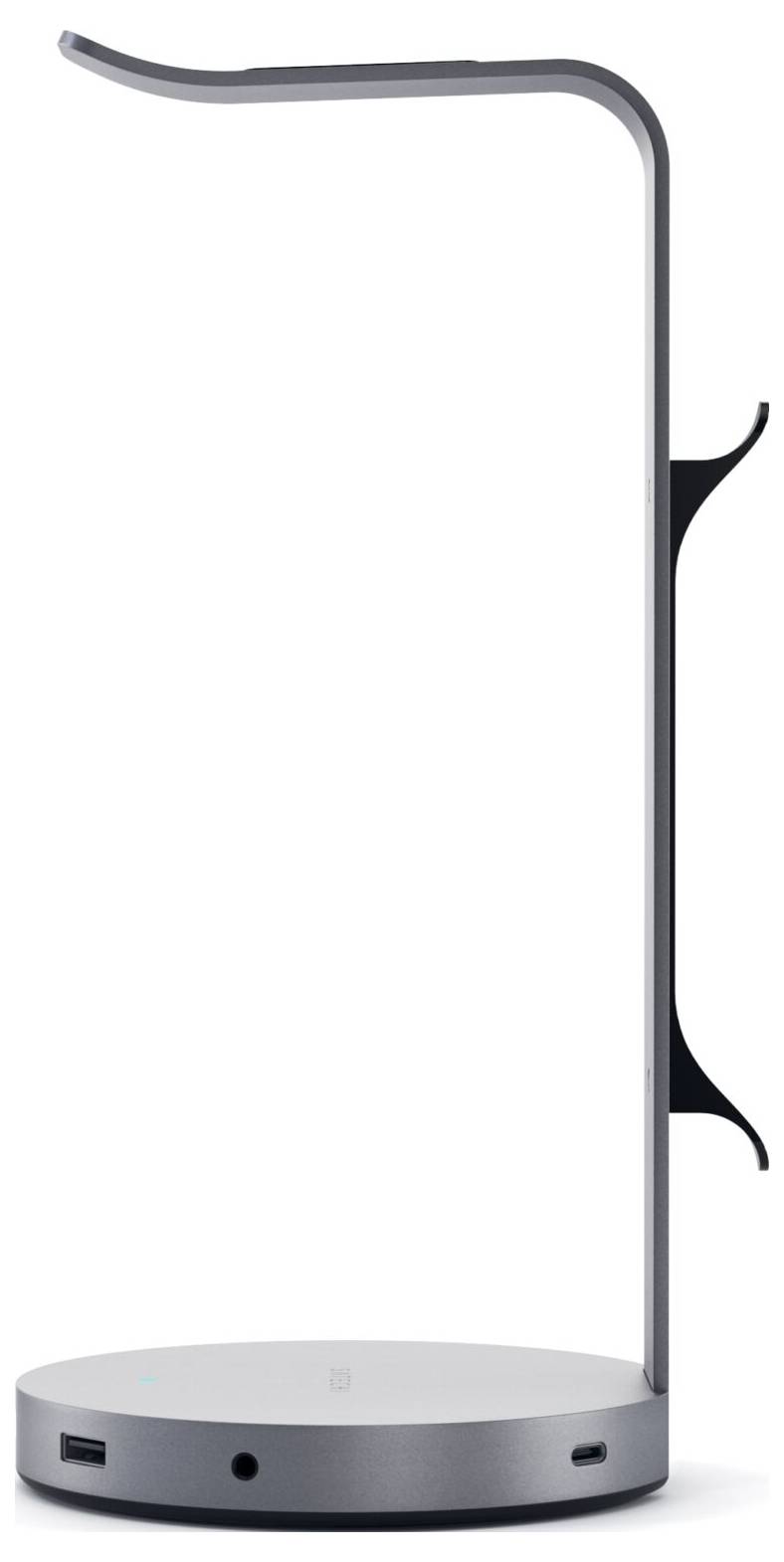 Ein silberner Kopfhörerständer mit integriertem USB-Anschluss und Kopfhörer-Buchse, minimalistisches Design.