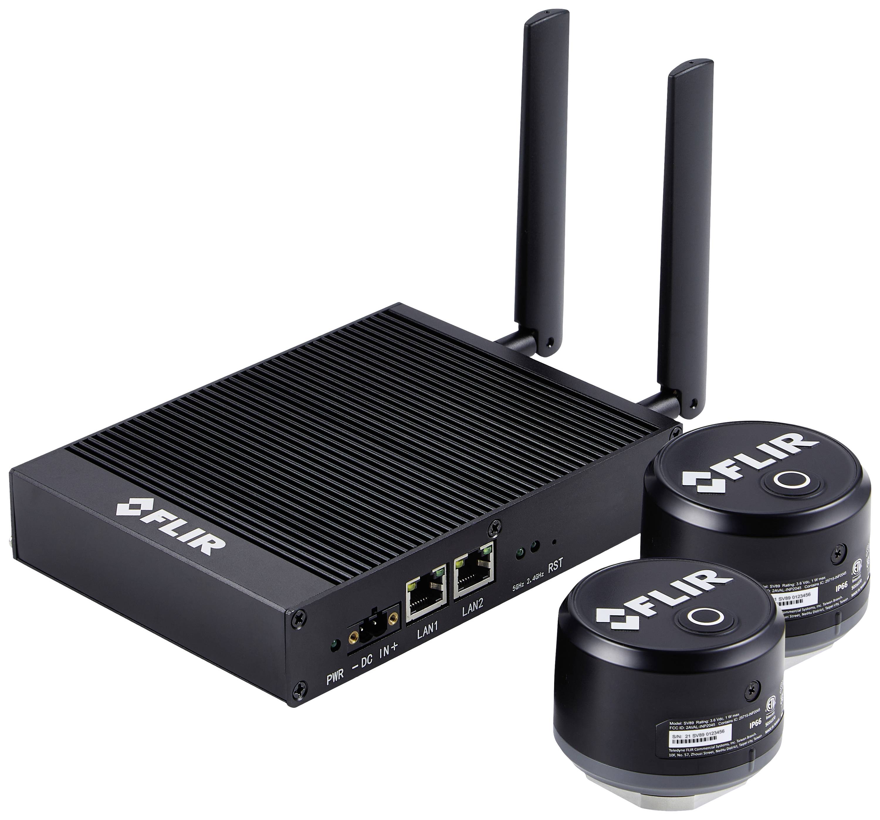 Ein schwarzes FLIR-Gerät mit zwei Antennen und zwei runden Sensoren. Es hat Ethernet-Anschlüsse und zwei LAN-Ports auf der Vorderseite.