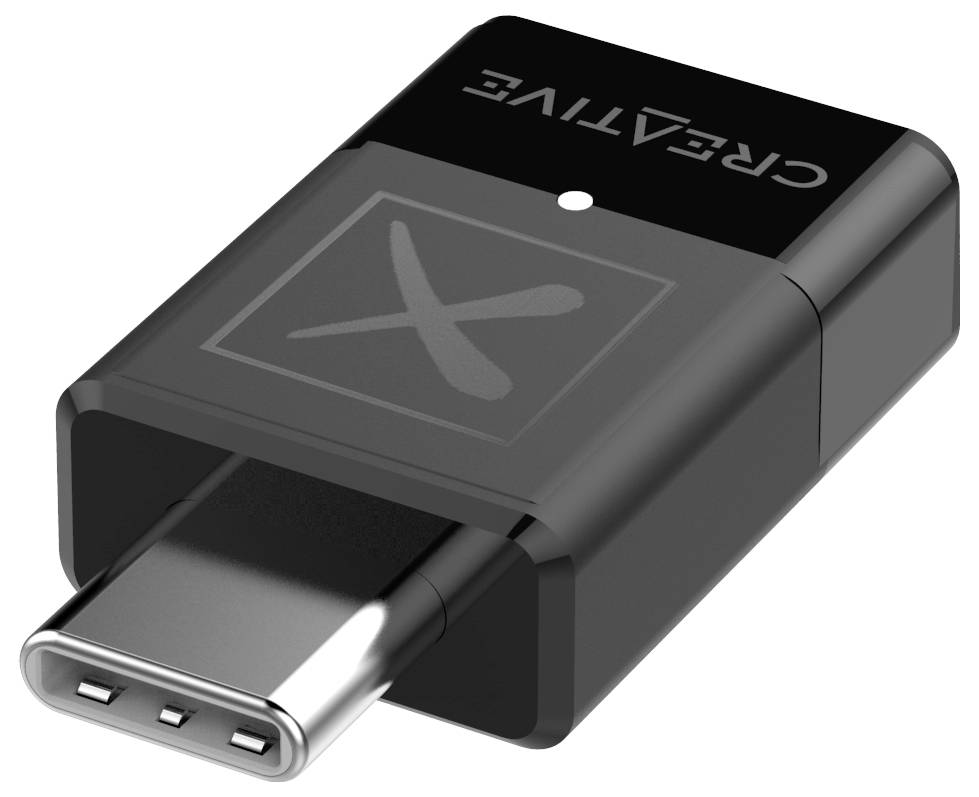 USB-C-Adapter mit der Aufschrift 'CREATIVE', schwarzes Gehäuse, kompakte Bauform, Anschluss sichtbar.