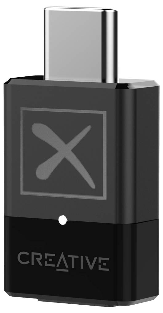 Ein schwarzer USB-C-Audioadapter mit der Aufschrift 'CREATIVE' und einem großen 'X' auf der Vorderseite.
