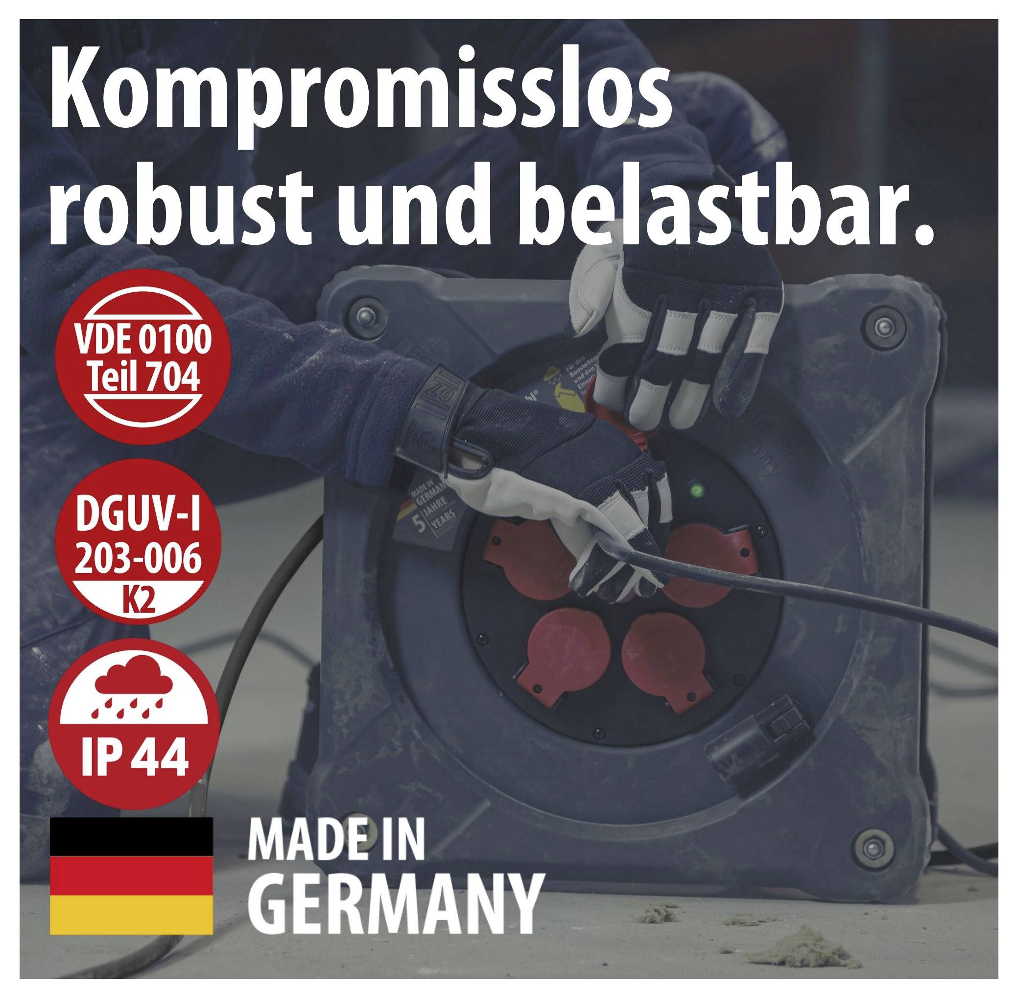 Werbung für ein robustes, belastbares Kabelgerät: 'Kompromisslos robust und belastbar', mit Prüfzeichen VDE 0100 Teil 704, DGUV-I 203-006 K2, IP44 und 'Made in Germany'.