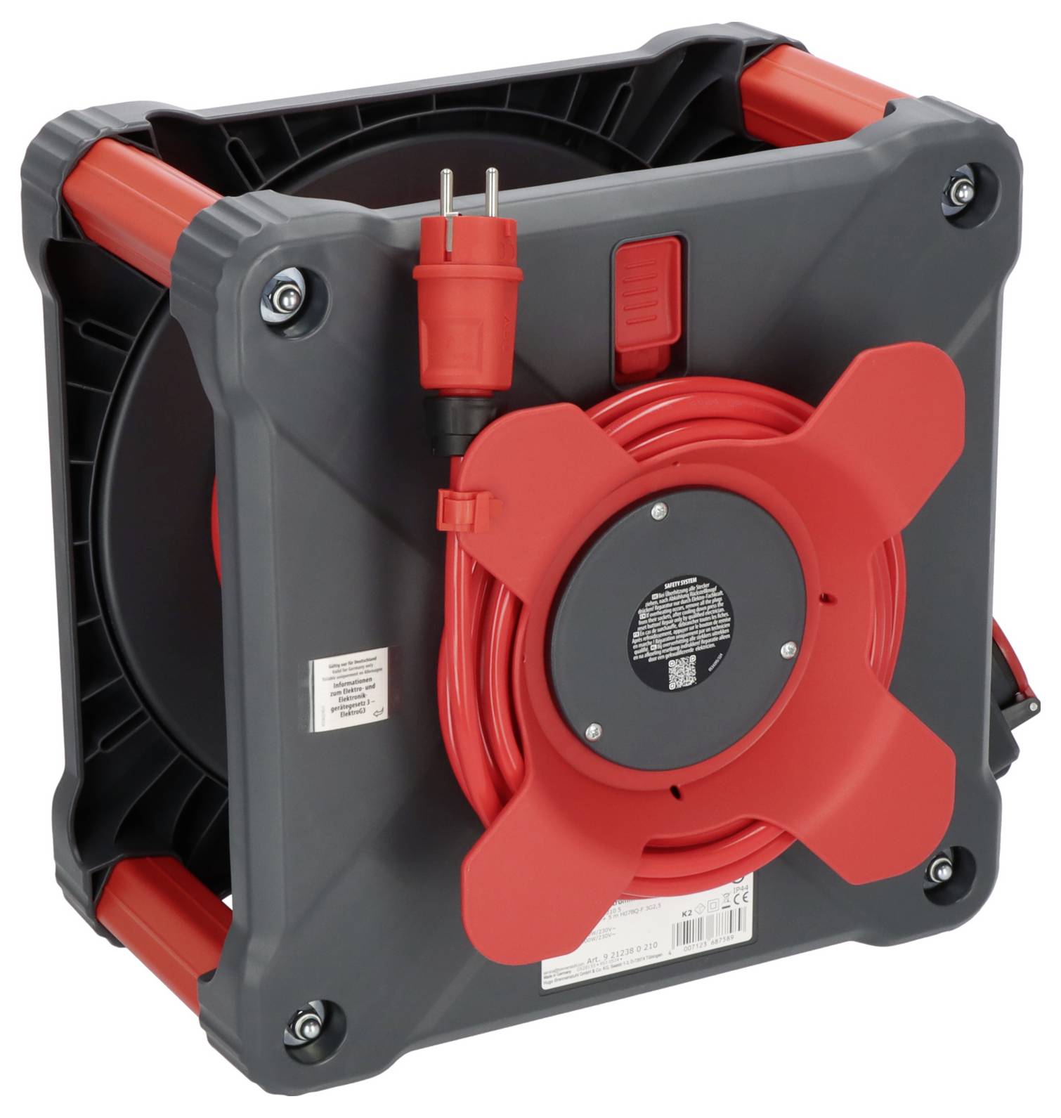 Ein graues Verlängerungskabel mit roter Kabeltrommel und Steckdose, geeignet für den Einsatz in Werkstätten oder Garagen.