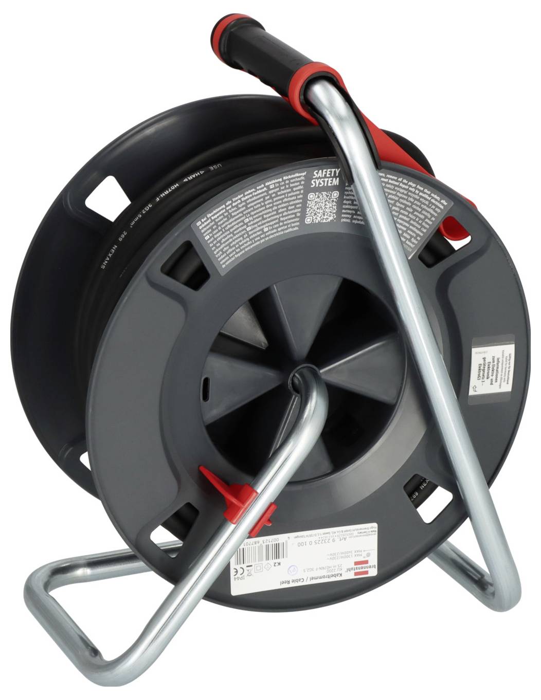 Eine graue Kabeltrommel mit rotem Griff und Metallgestell steht aufrecht. Sie ist bereit für den Einsatz zur sicheren Kabelführung.