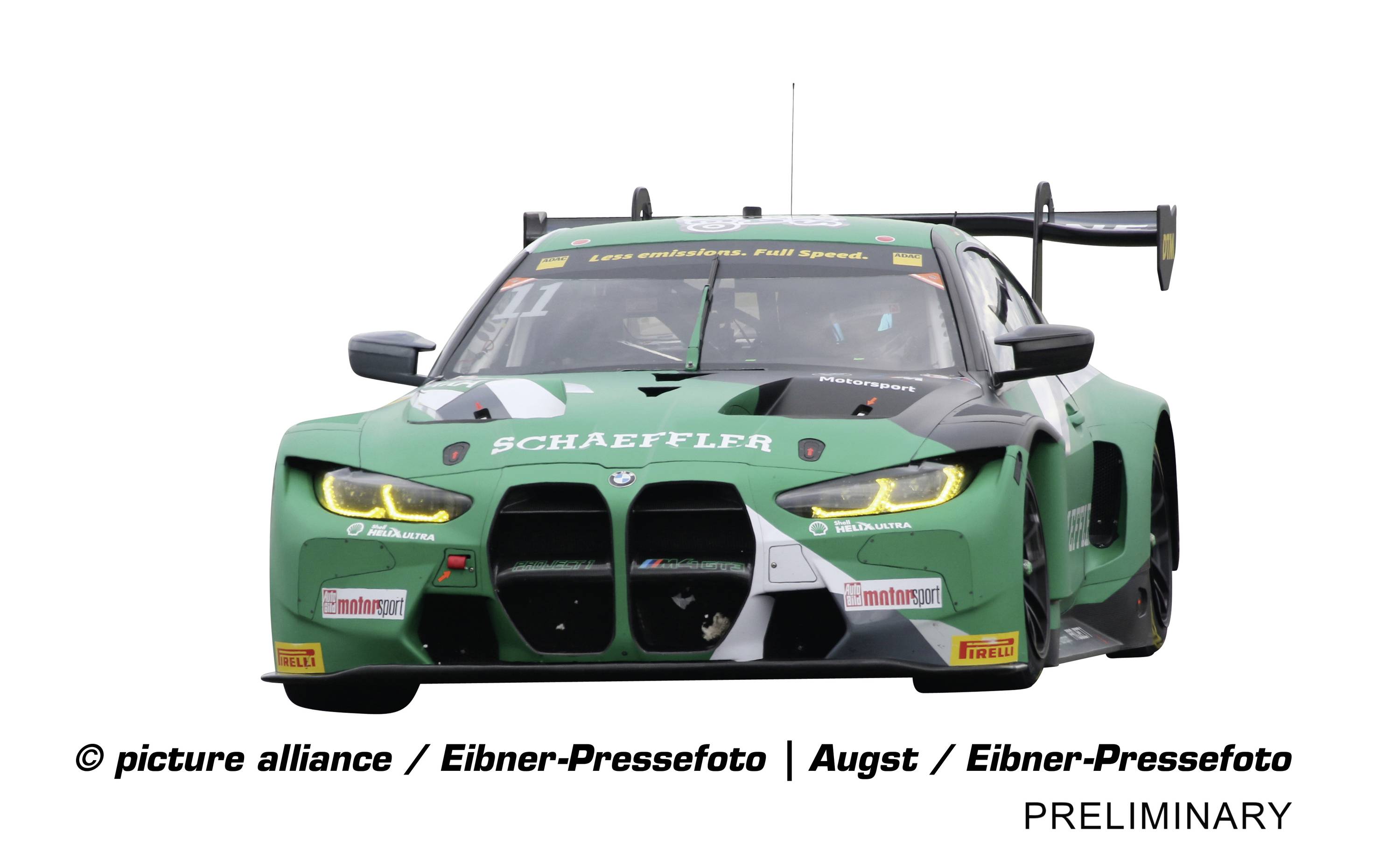 Grüner Rennwagen mit der Aufschrift 'Schaeffler' fährt frontal in die Kamera. Markenlogos sind sichtbar.