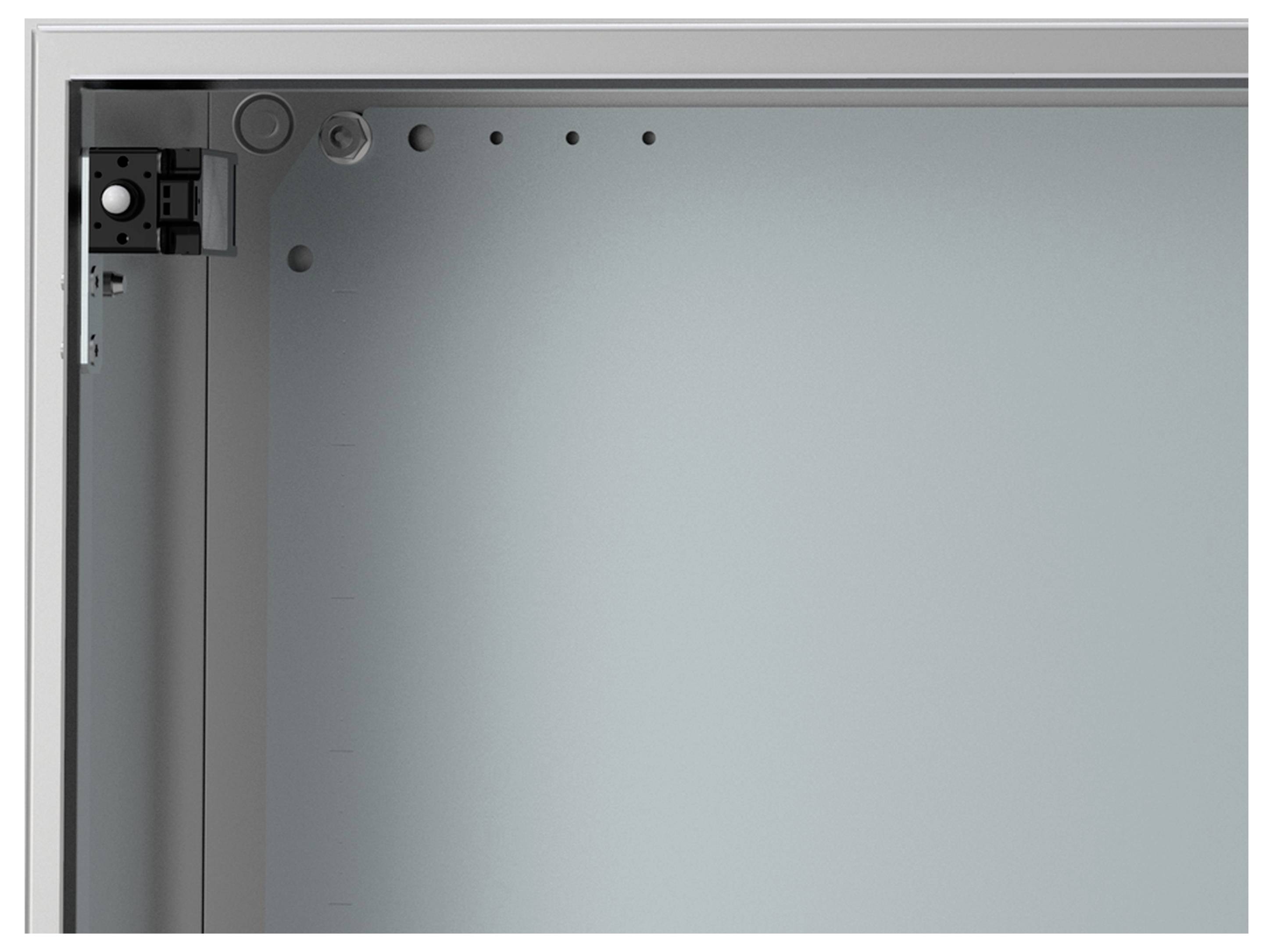 Ein graues Metallrahmen-Detail mit Schrauben und runden Abdeckungen, möglicherweise Teil eines Gehäuses oder Schranks in Nahaufnahme.