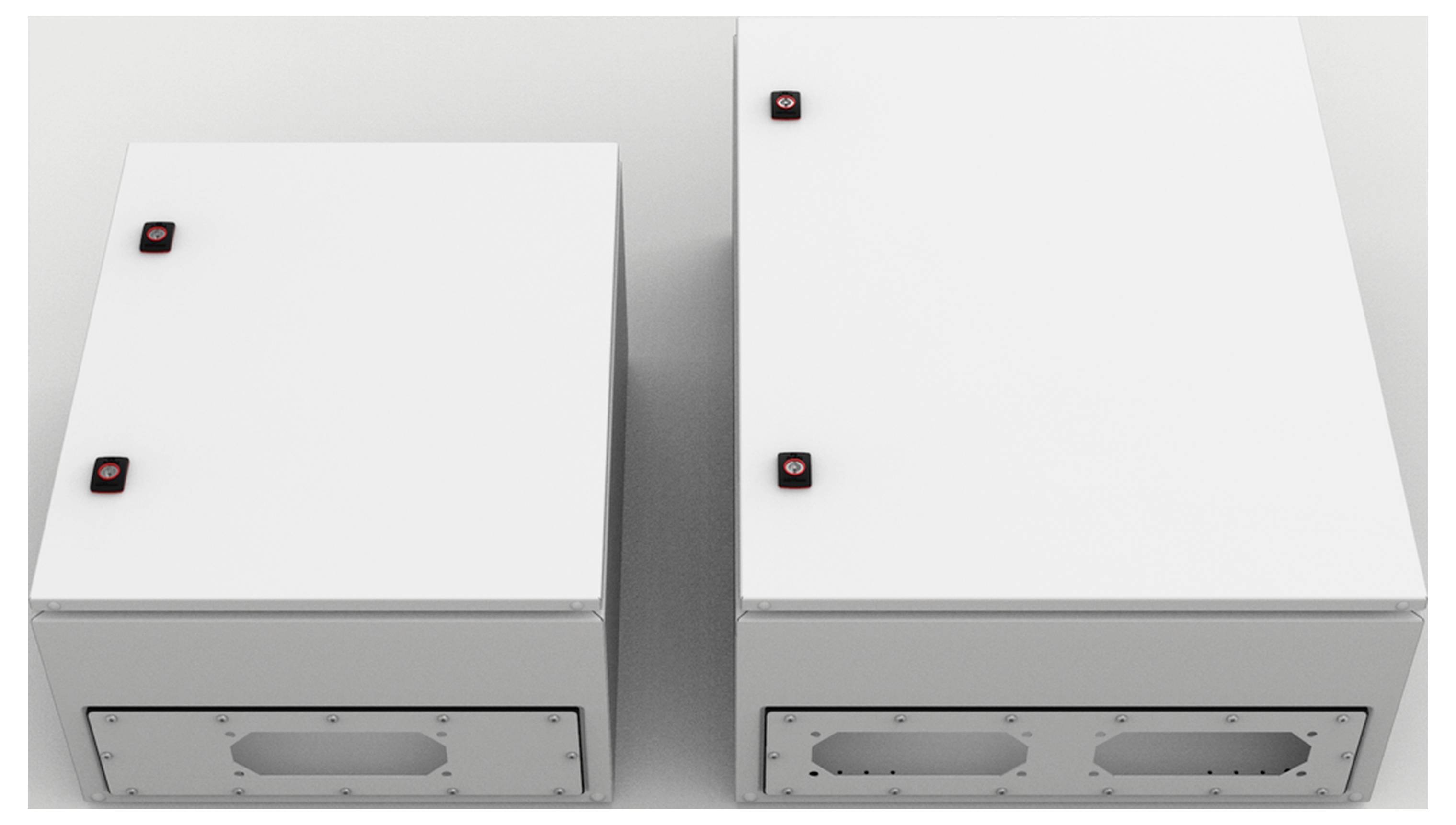 Zwei weiße rechteckige Geräte mit roten Knöpfen auf der Oberseite, nebeneinander platziert, zeigen eine Größenunterschied.