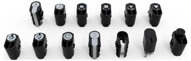 Verschiedene schwarze Verbindungselemente in zwei Reihen. Jedes Element hat unterschiedliche Formen und Symbole an den Oberseiten.