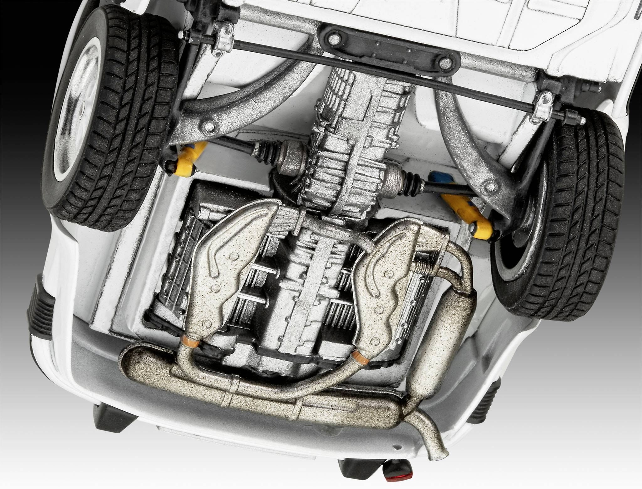 Ansicht des Unterbodens eines Autos mit sichtbarem Auspuffsystem, Ersatzreifen und Teilen der Federung. Detailreiche Darstellung der Metallteile.
