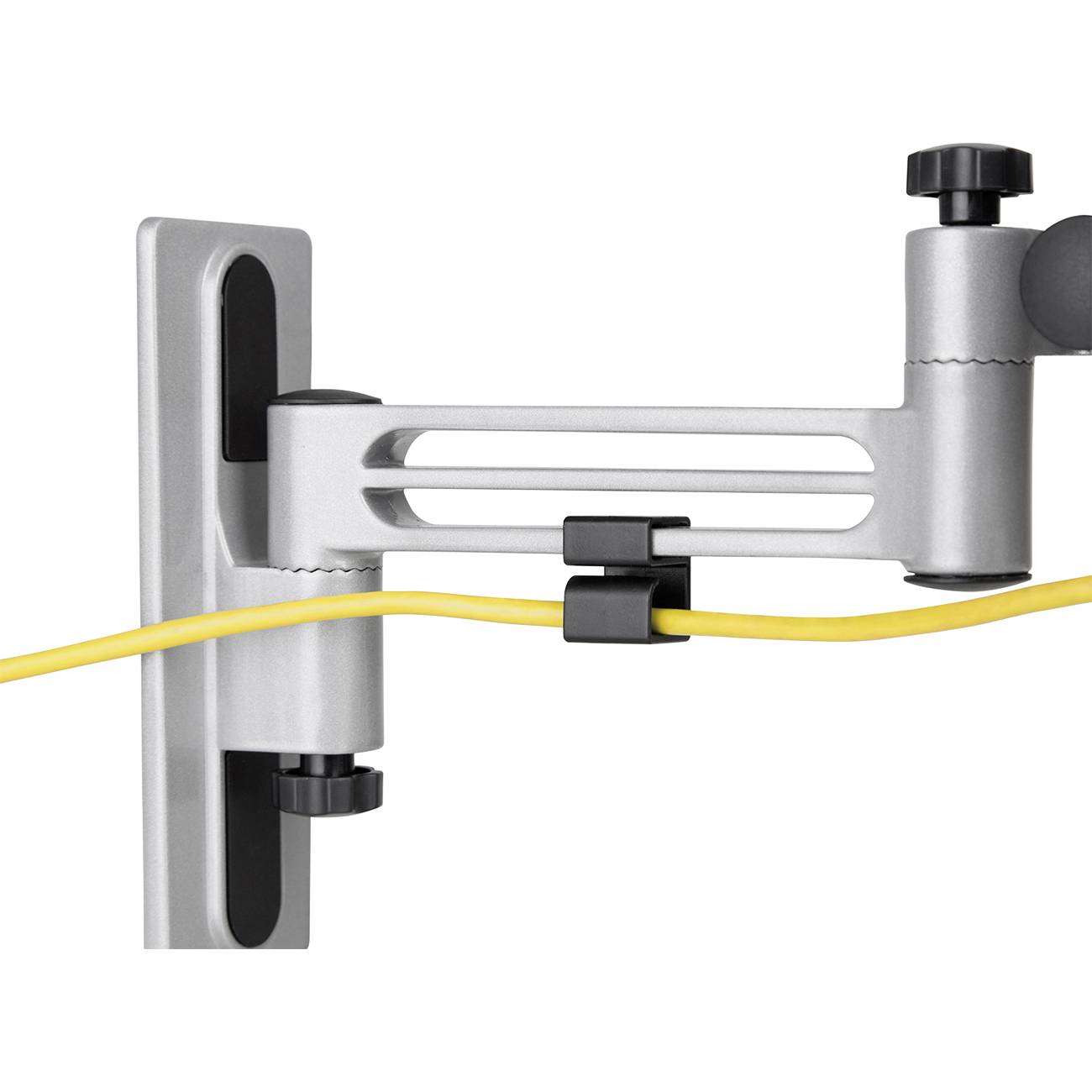 Ein gelbes Kabel verläuft durch eine weiße Kabelhalterung an einer grauen Wandhalterung, die beweglich ist.