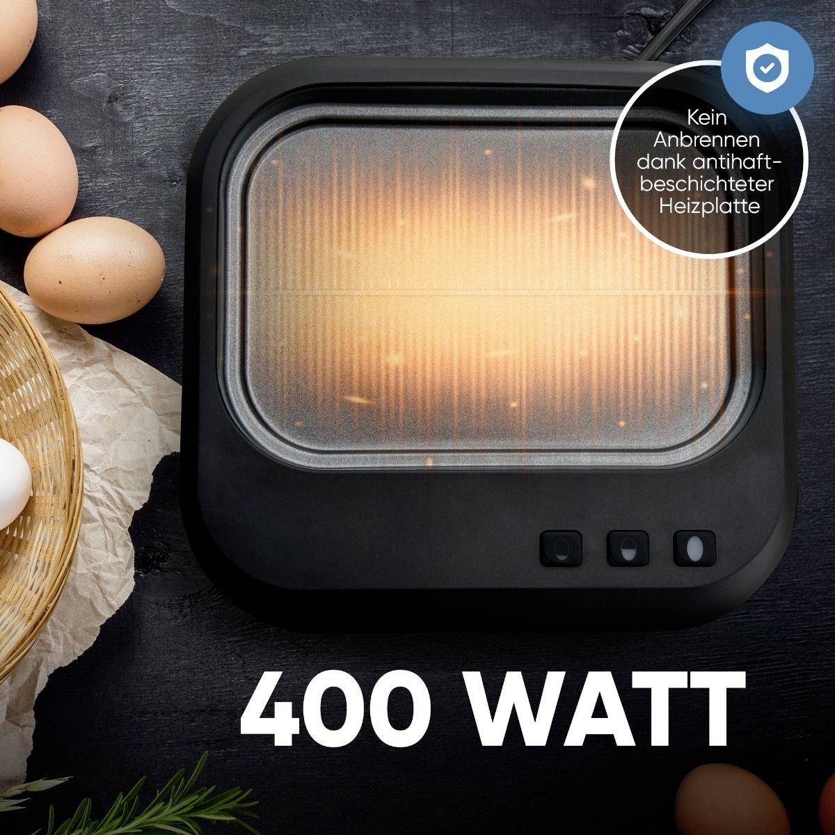 Elektrogerät mit beleuchteter Heizplatte und der Anzeige '400 WATT'. Der Text weist auf eine antihaftbeschichtete Heizplatte hin.