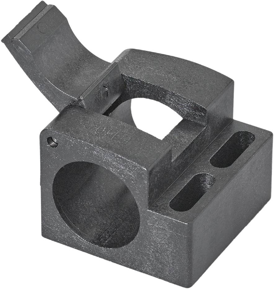 Ein rechteckiges, metallisches Bauteil mit einer runden Öffnung und zwei länglichen Schlitzen, vermutlich für industrielle Anwendungen.