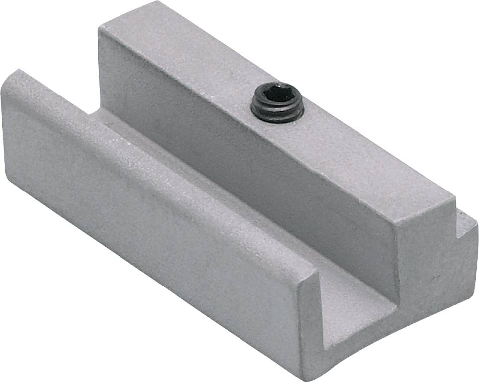 Metallschiene mit rechteckigem Querschnitt und einer kleinen Schraube auf der Oberseite, vor schwarzem Hintergrund.