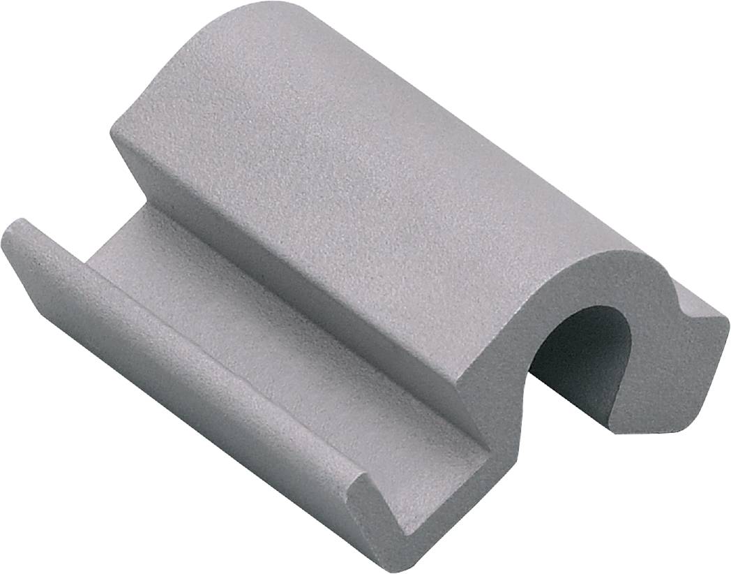 Graues, geschwungenes Metallprofil mit rundem Ausschnitt und flachem Unterteil, möglicherweise ein Maschinenteil oder Bauelement.