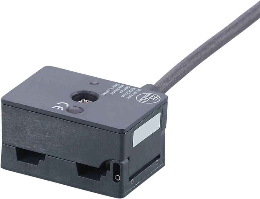 Ein rechteckiger elektrischer Sensor mit Kabelanschluss, geeignet zur Erkennung von Objekten in industriellen Anwendungen.