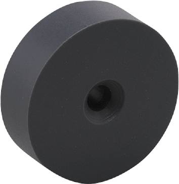 Schwarzes rundes Rad oder Scheibe aus festem Material mit einem zentralen Loch, möglicherweise eine Komponente eines Mechanismus.