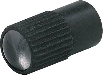 Ein schwarzer, geriffelter Drehknopf aus Metall von der Seite fotografiert.