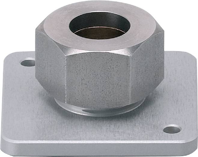 Metallische sechseckige Vorrichtung auf einer quadratischen Platte mit Loch in der Mitte, möglicherweise Teil einer Maschine.