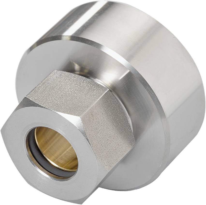 Silbernes, zylindrisches Metallteil mit sechseckiger Schraubenmutter und messingfarbener Innenfassung, vermutlich ein technisches Bauteil.