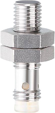 Ein silbernes Metallteil mit Hexagonform, möglicherweise eine Schraubverbindung oder ein Ventil, vor einem neutralen Hintergrund.