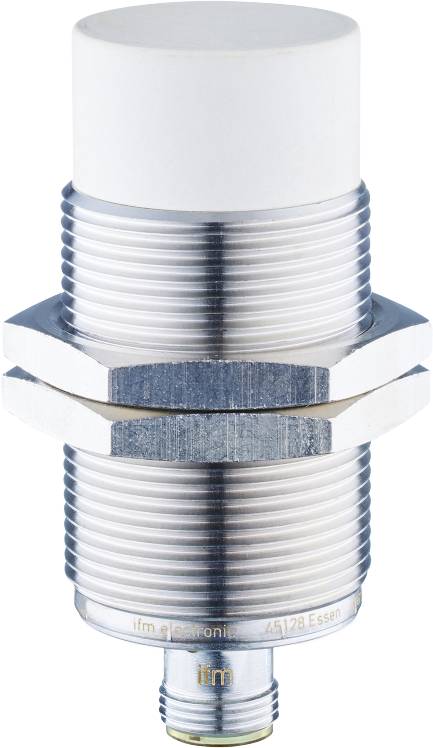 Nahaufnahme eines zylindrischen Metallsensors mit Gewinde, geeignet für industrielle Anwendungen. Der Sensor ist silbern und weist Rillen auf.