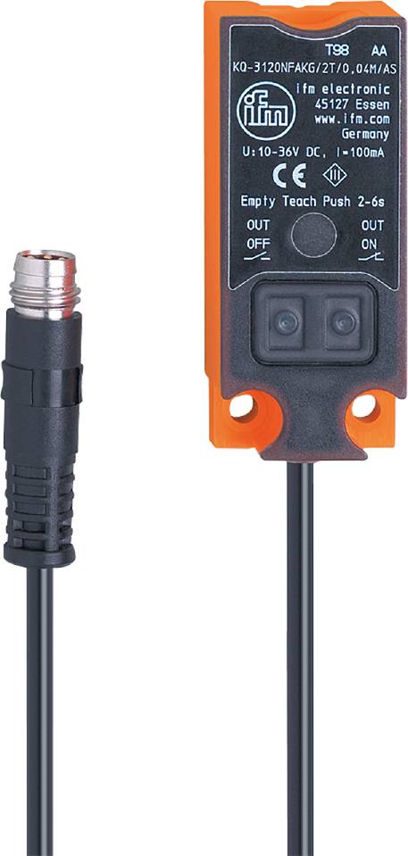 Ein orangefarbener elektrischer Schalter mit zwei schwarzen Knöpfen, neben einem schwarzen Kabel mit Metallanschluss.