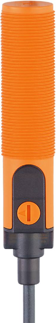 Ein oranges Bauteil mit geripptem oberen Teil und einer ovalen, schwarzen Fläche in der Mitte.