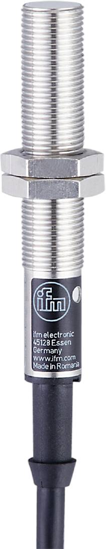 Sensor mit zylindrischem Metallgehäuse, oben sichtbar. Zeigt ein Firmenlogo auf dunklem Hintergrund.