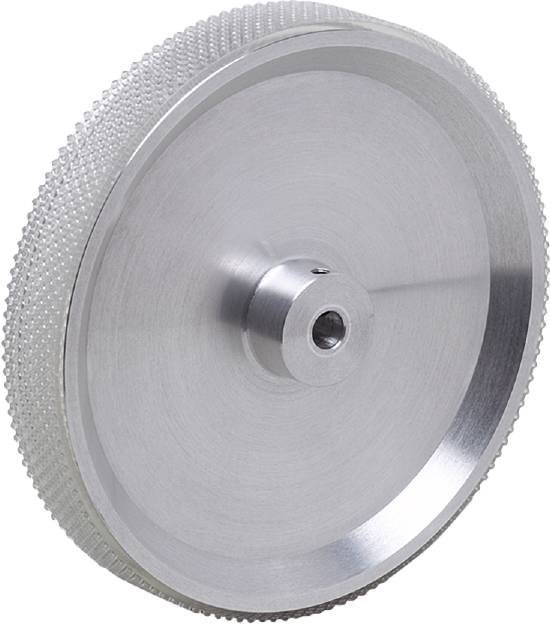 Metallrad mit geriffelter Oberfläche und zentraler Bohrung, möglicherweise ein Bestandteil einer Maschine oder eines Gerätes.