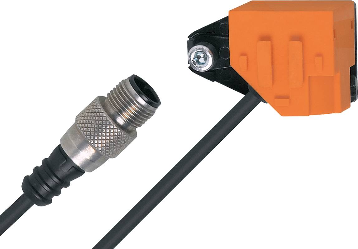 Ein Metallstecker neben einem schwarzen Kabel, das mit einem orangefarbenen Gerät verbunden ist, möglicherweise ein Sensor.