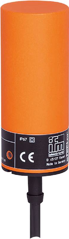 Eine orangefarbene zylindrische Oberfläche mit schwarzer Markierung, auf der Wörter und Symbole zu sehen sind, darunter 'IP67'.