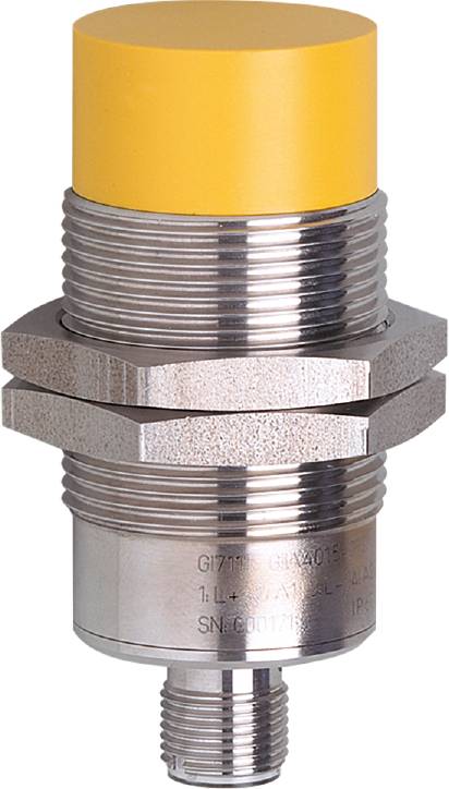 Ein zylindrischer induktiver Sensor mit gelbem Kopf und Metallgewinde. Firma TURCK. Modell IM N18U-M30-I-ZS4X-H1141.
