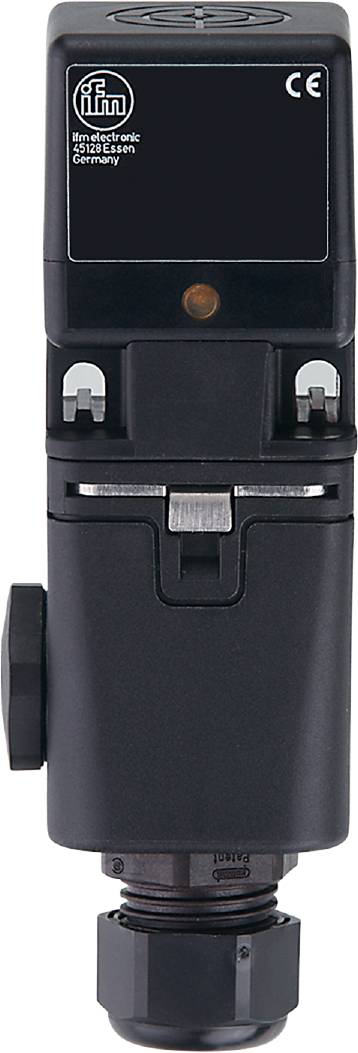 Ein schwarzer elektrischer Schalter mit zwei Schraubenlöchern und einem Hebel in der Mitte.