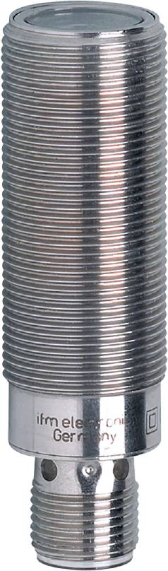 Nahaufnahme einer metallischen Gewindeschraube mit gleichmäßigen spiralförmigen Rillen.