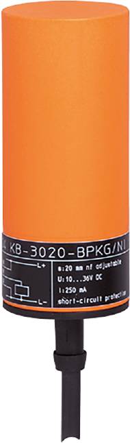 Oranger Zylinder mit schwarzem Etikett; technische Angaben wie '20 mm n/f einstellbar' und 'U: 10...36V DC'.