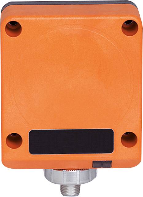 Ein orangefarbenes rechteckiges Gerät mit vier runden Löchern an den Ecken, vermutlich ein elektronisches Modul oder Sensor.