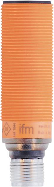 Geriffelte orangefarbene Oberfläche, möglicherweise Wellpappe, aus der Nähe betrachtet.