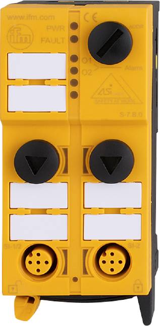 Gelbes Gerät mit sechs rechteckigen, weißen Tasten und zwei schwarzen Pfeilschaltern. Oben links ein kleines Logo.