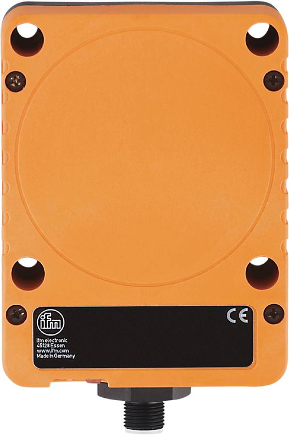 Ein orangefarbenes, quadratisches elektronisches Gerät mit schwarzen Löchern in den Ecken und einem schwarzen Etikett unten mit technischen Informationen.