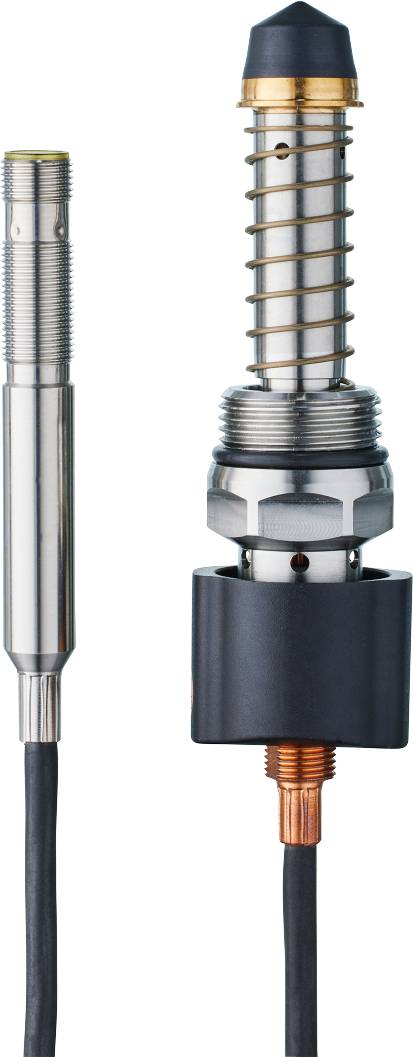 Nahaufnahme eines Metallventils mit spiralgeformter Federmechanik, das aus einem zylinderförmigen Gehäuse herausragt.