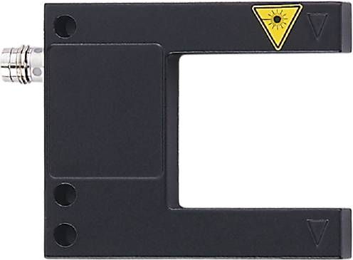 Eine dunkle Metallplatte mit einem gelben Warnsymbol oben rechts, das auf Laserstrahlung hinweist.